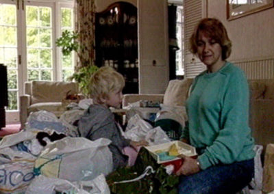 Les and Joel sorting out the baby clothes romania