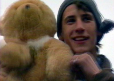 Romania Older orphan with teddy Bair